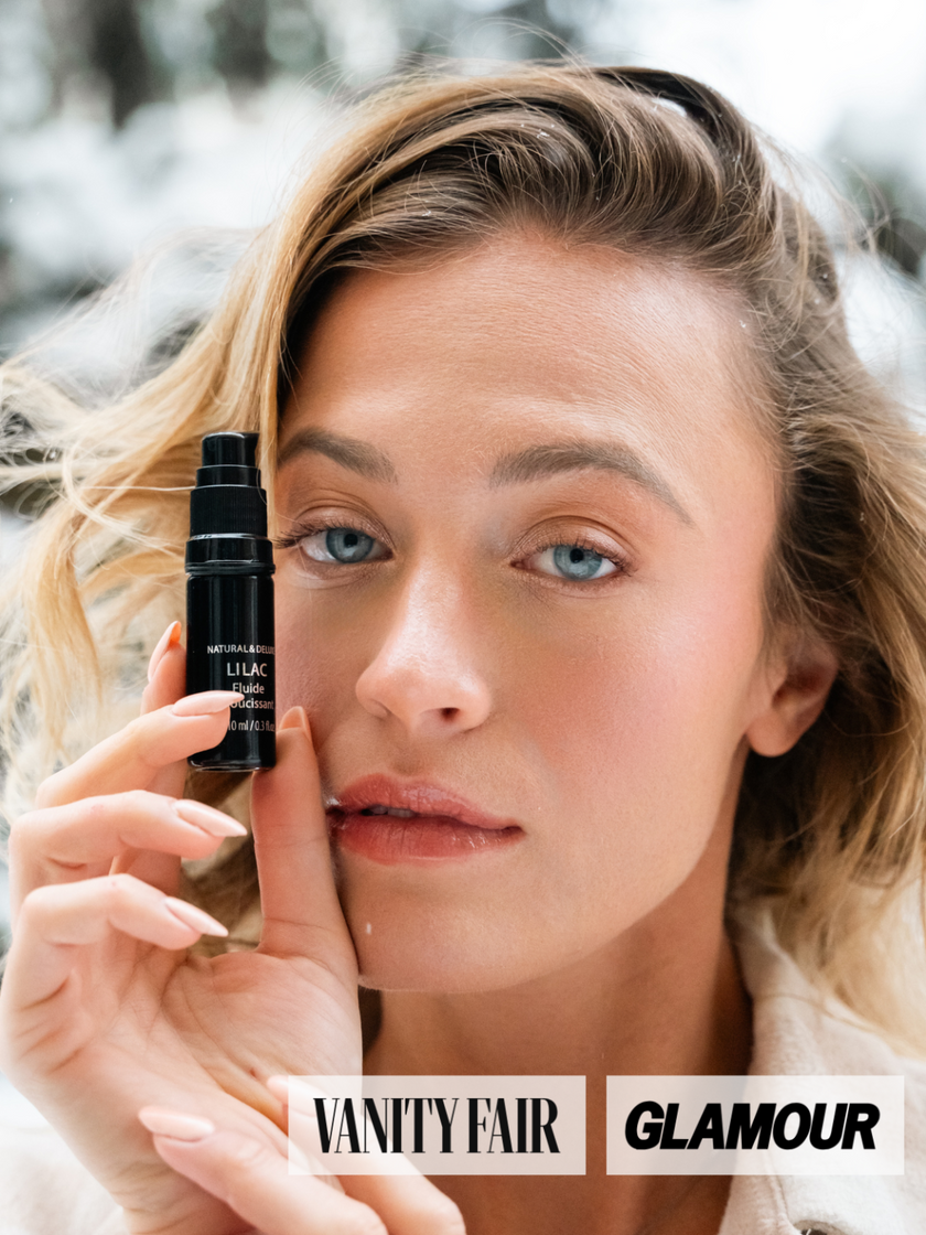 Bottle of Lilac Ritual Fluid with CO2-extracted lilac blossoms, organic face elixir for tenderness, glow, skin renewal, and repair of scars and age spots