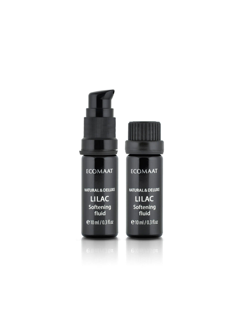 Bottle of Lilac Ritual Fluid with CO2-extracted lilac blossoms, organic face elixir for tenderness, glow, skin renewal, and repair of scars and age spots
