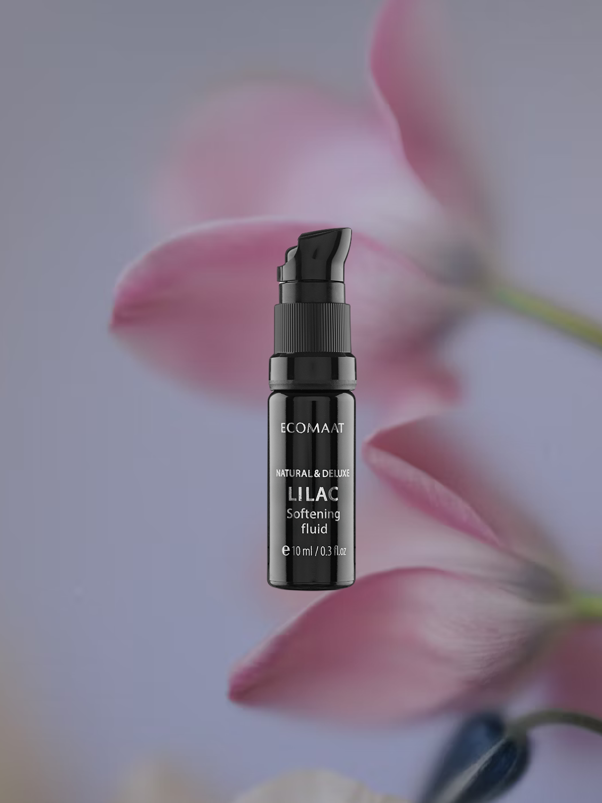 Bottle of Lilac Ritual Fluid with CO2-extracted lilac blossoms, organic face elixir for tenderness, glow, skin renewal, and repair of scars and age spots