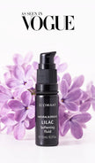 Bottle of Lilac Ritual Fluid with CO2-extracted lilac blossoms, organic face elixir for tenderness, glow, skin renewal, and repair of scars and age spots