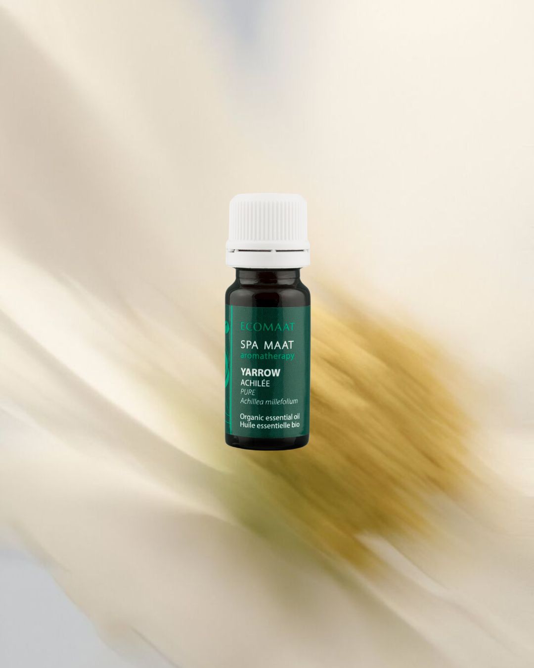 100% certified organic Yarrow essential oil (Achillea millefolium) in a 10ml pharmaceutical-grade glass bottle, steam-distilled from wild yarrow flowers and stems.
